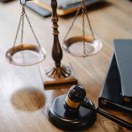 judges desk with gavel and scales