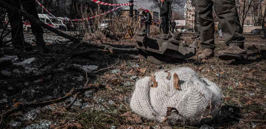 knitted hat lying among debris in ukrainian city