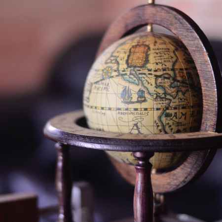 shallow focus photography of brown globe