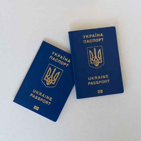 passports on white surface