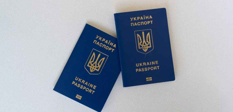 passports on white surface