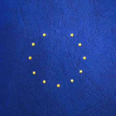 blue and yellow round star print textile